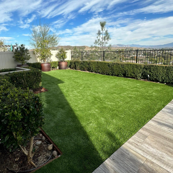 The Science Behind Artificial Grass Drainage Systems: Ensuring a Water-Resistant Lawn